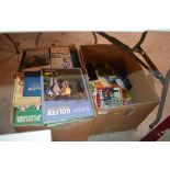 Two boxes of various golfing and other books