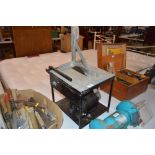 A table circular saw (needs re-wiring) - sold as s