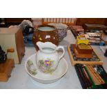 A floral decorated toilet jug and basin; and a gla