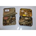 A quantity of various military cap badges etc.