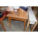 A retro Formica topped draw leaf kitchen table