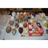 A quantity of pottery pig money boxes, and various