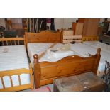 A modern solid pine 4'6" double bed with Bed Facto