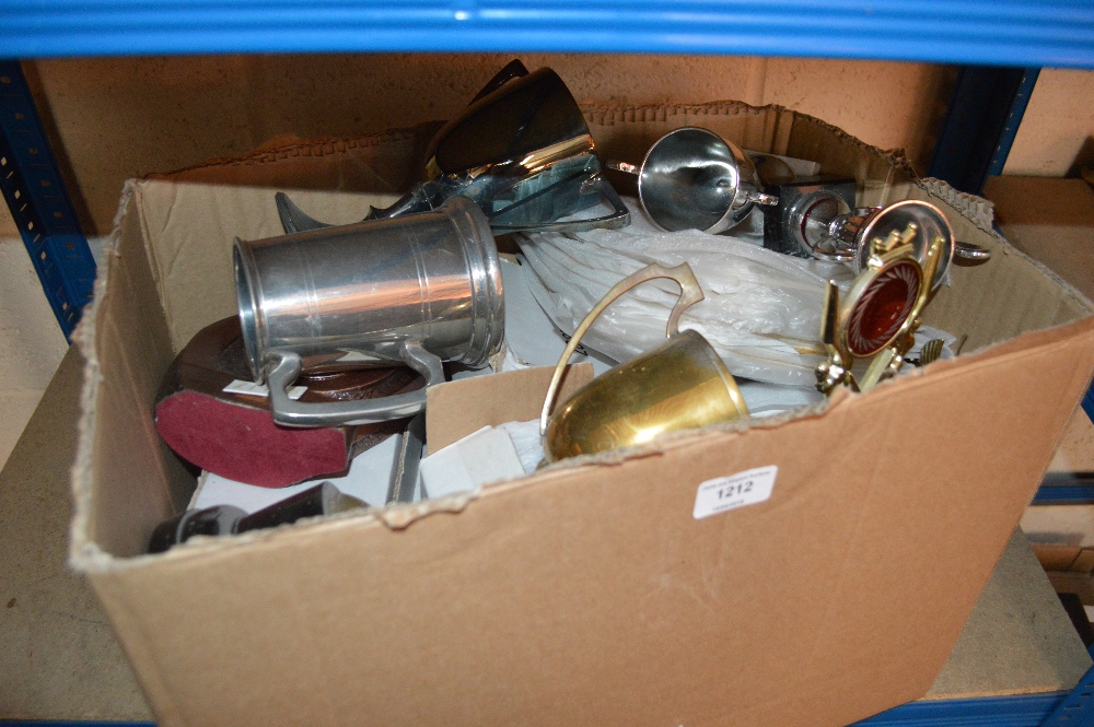 A box of various sports trophies