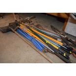 A quantity of garden tools including spears, axe a