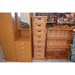 A modern wood and eight wicker drawer upright stor