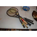 A quantity of badminton and tennis rackets