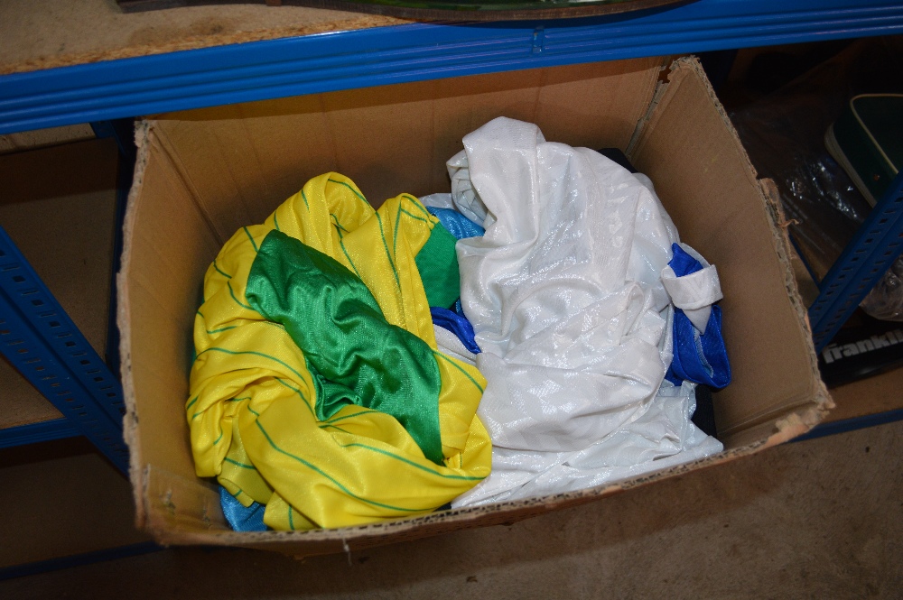 A box of miscellaneous sports clothing