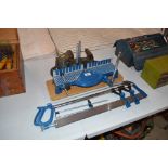 A bench vice and mitre saw