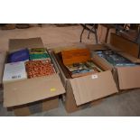 Three boxes of miscellaneous books and picture fra
