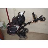 A Moto Caddy electric golf trolley