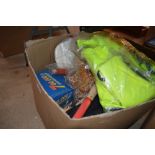 A box containing various rounders bats, baseball e