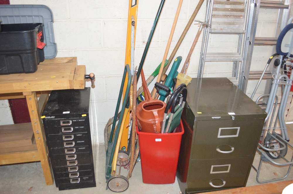 A quantity of gardening tools including watering c