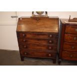 A 19th Century mahogany bureau, the fall front opening to reveal an interior arrangement of