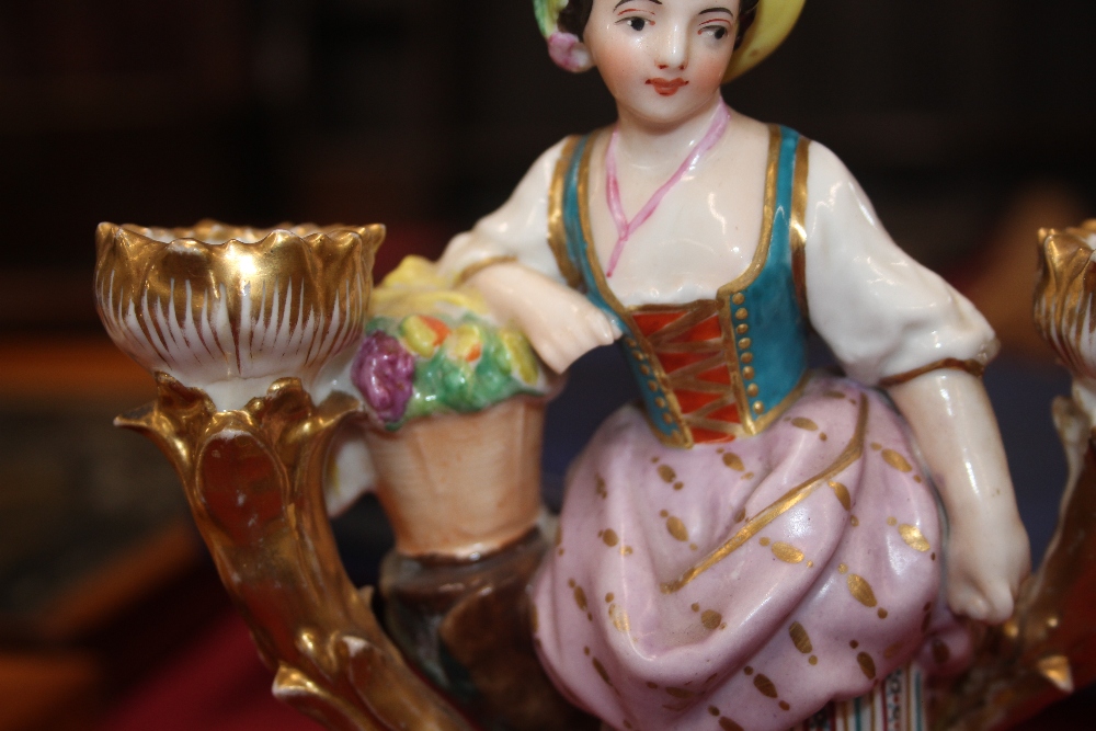A 19th Century continental porcelain figural decorated twin branch candle holder, in the form of a - Image 2 of 14