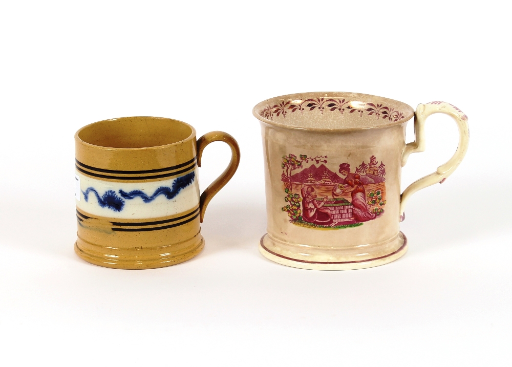 A 19th Century Mocha ware mug, 10cm high; and a pink lustre mug decorated with a scene of Rebecca at