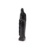 A carved dark wood religious figure, 27cm