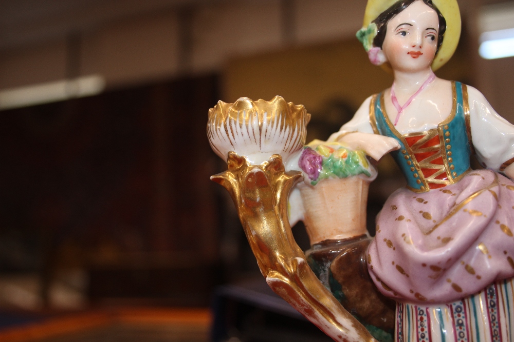 A 19th Century continental porcelain figural decorated twin branch candle holder, in the form of a - Image 4 of 14