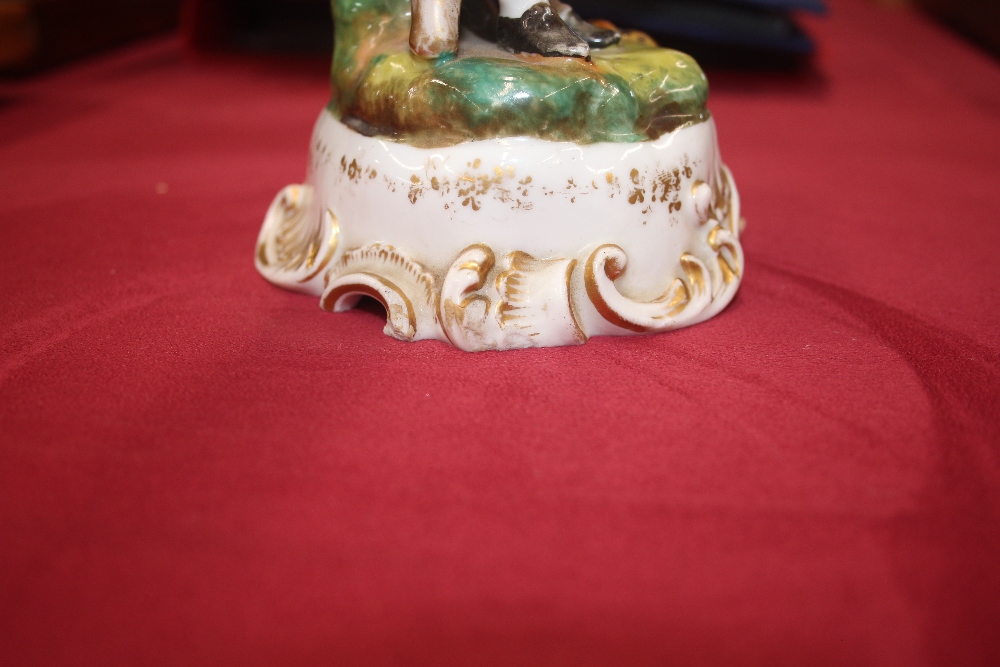 A 19th Century continental porcelain figural decorated twin branch candle holder, in the form of a - Image 5 of 14