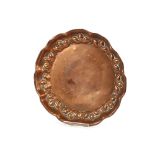 An Arts & Crafts circular copper lobed shallow dish, 25cm dia.