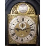 An 18th Century lacquered and chinoiserie decorated long case clock, the arched hood enclosing a