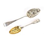 A George III silver berry spoon, London 1780; and another hallmarked for Newcastle 1815, with gilded