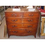 A 19th Century mahogany chest, of two short and three long graduated drawers, raised on a shaped