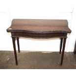 A 19th Century mahogany serpentine fronted card table, the baize lined fold over top supported on