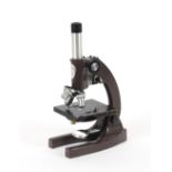 A Swift Nine Fifty series microscope, no. 693490, x4, x10, x40 objectives, 32cm