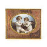 A 19th Century miniature painting, depicting two cherubs, contained in brass mounted easel frame