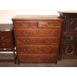 An 18th Century oak chest, fitted two short and four long graduated drawers, raised on bracket feet,