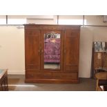 An Edwardian mahogany chequer strung triple wardrobe, having painted classical figure and foliate
