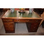 An early 20th Century mahogany twin pedestal partner's desk, fitted opposing drawers, 152cm wide x