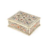 An Islamic marble box and cover, having inlaid floral decoration 20.5cm x 16.5cm