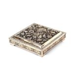 A finely worked Indian white metal square box, profusely decorated with birds and flowers, 20cm