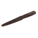 A 19th Century carved wooden lime spatula, probably Oceanic, 36cm long