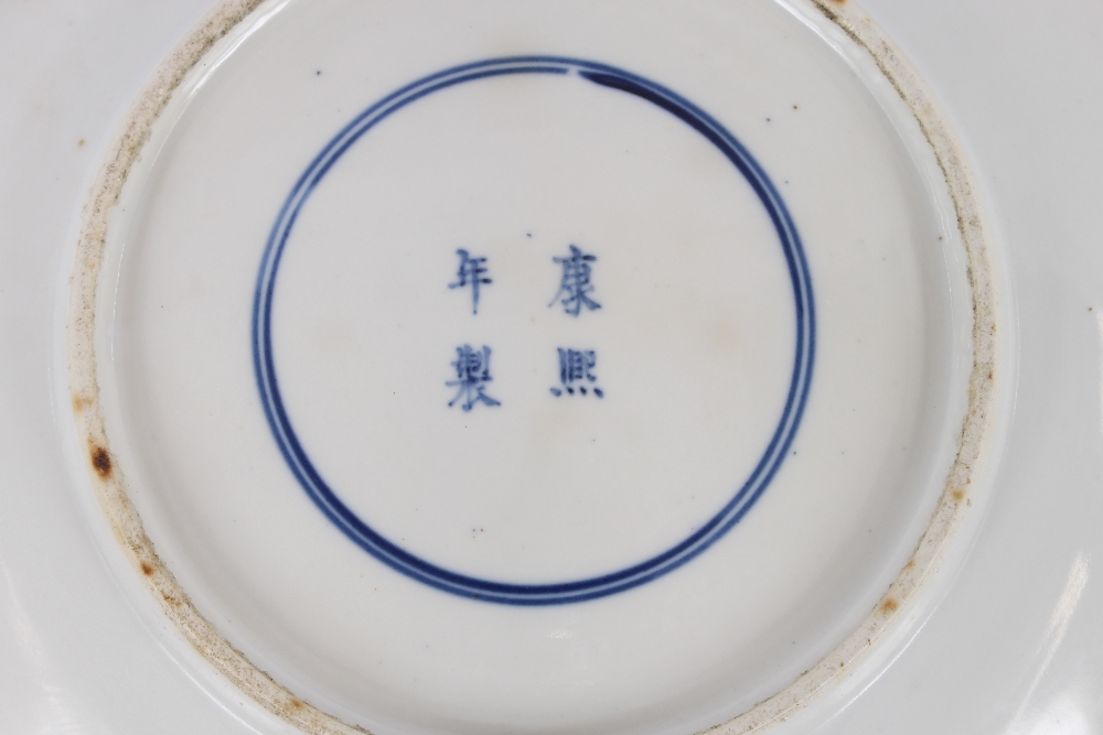 An 18th Century Chinese blue and white plate, the body profusely decorated with exotic birds and - Image 3 of 8