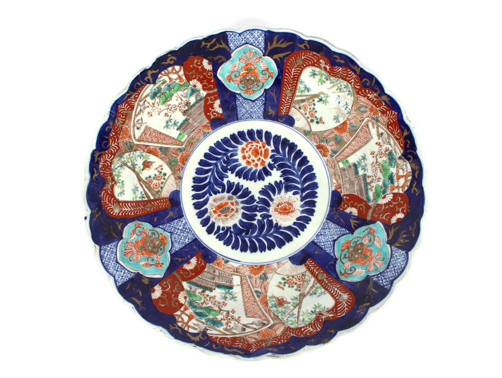 A pair of 19th Century Japanese Imari chargers, having scallop borders, panels decorated with - Image 2 of 4