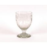 A large 19th Century etched glass goblet, having foliate and fruit decoration, raised on a