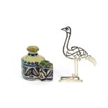 A 19th Century Egyptian white metal study of a bird, constructed by joined calligraphic symbols; and