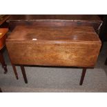 A 19th Century mahogany drop leaf cottage dining table, raised on square section supports, 93cm