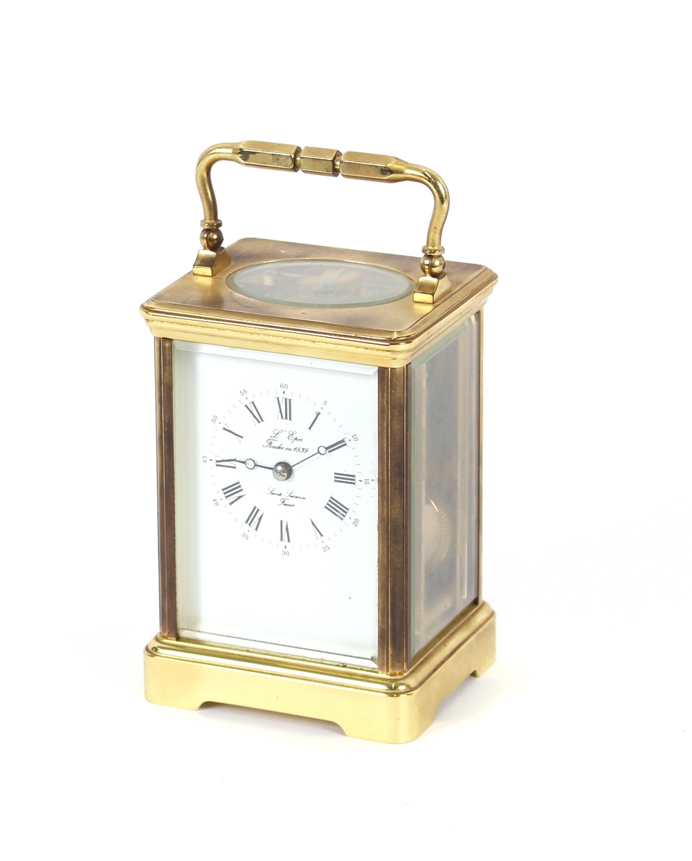 A French brass cased carriage clock, with white enamel dial, signed L'Epee Sainte Suzanne,