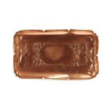 A copper Arts & Crafts tray, having shaped border, 35cm x 20cm