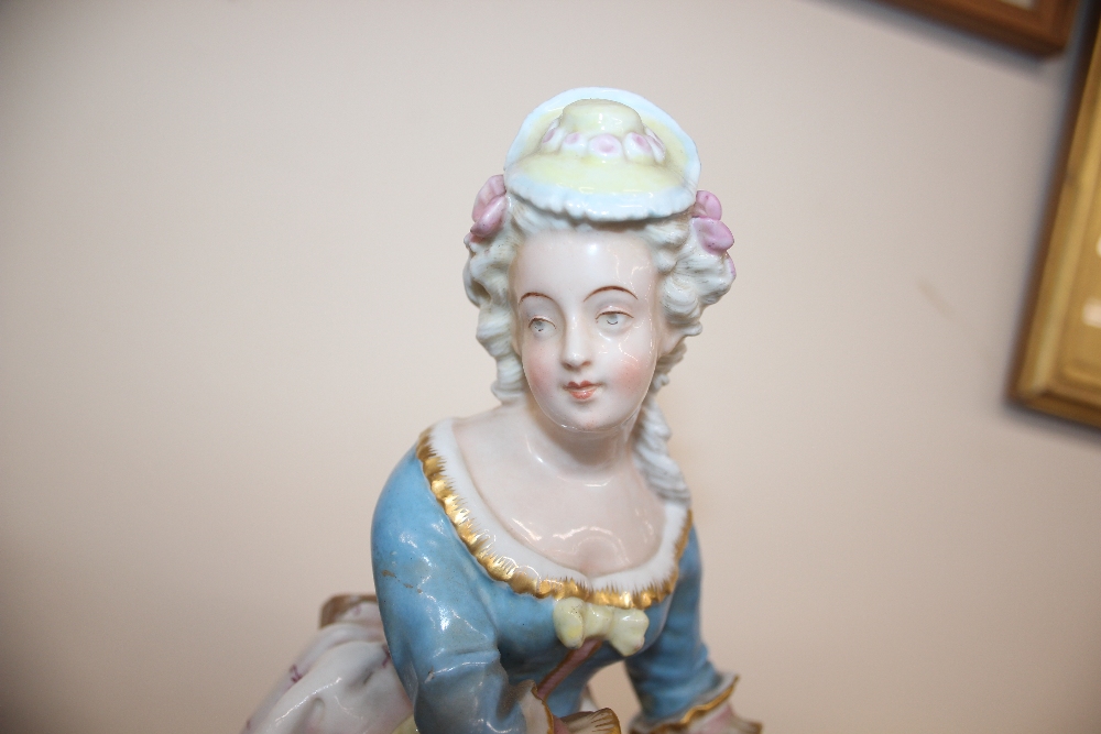 A pair of late 19th Century Meissen style figures, depicting maid and youth, raised on floral - Image 2 of 13