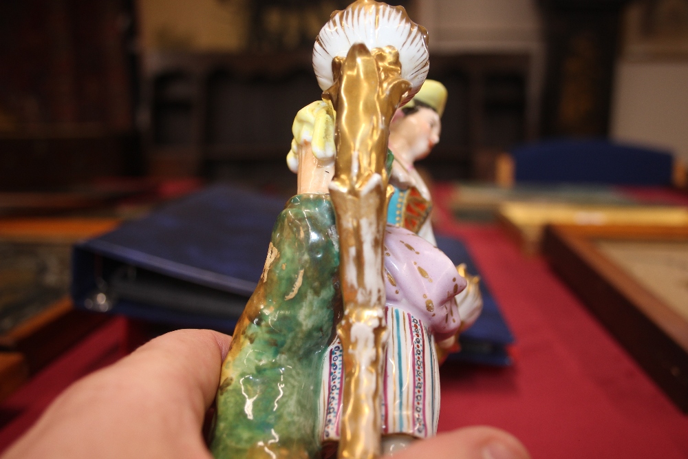 A 19th Century continental porcelain figural decorated twin branch candle holder, in the form of a - Image 12 of 14