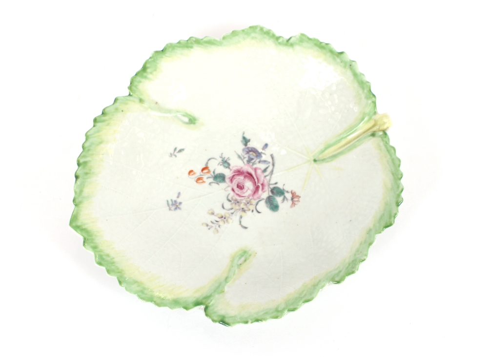 A First Period Worcester porcelain Mulberry leaf shaped dish, the finely vein moulded ground painted