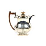 A George III silver baluster coffee pot, maker Samuel Hennell, of half fluted body design with