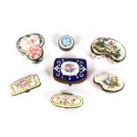 A collection of six various porcelain and enamel decorated patchboxes, and an enamel purse, AF