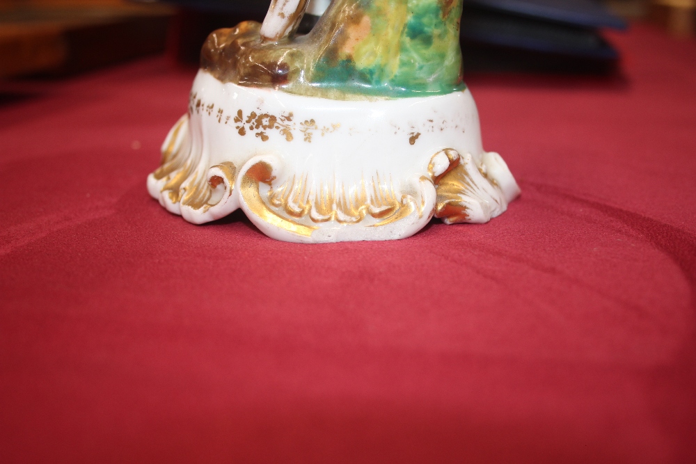 A 19th Century continental porcelain figural decorated twin branch candle holder, in the form of a - Image 7 of 14