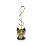 A 19th Century brass and cast iron door stop, in the form of a fox's head with riding whip handle,